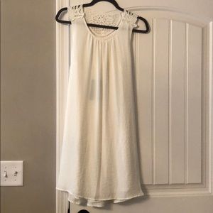 White dress with lace detail on back
